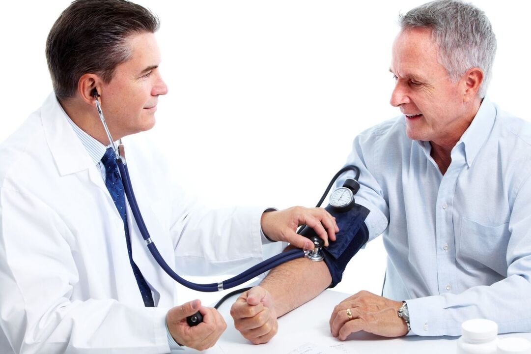 The doctor measures the patient's pressure with high blood pressure